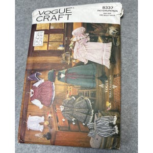 May include: A vintage Vogue Craft sewing pattern for doll clothes. The pattern features various doll outfits, including dresses, coats, and pants. The cover displays the doll clothes in different colors and styles, with the Vogue Craft logo at the top.