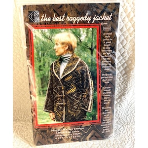 May include: A package for "the best raggedy jacket" sewing pattern. The jacket is a casual style with a flattering collar and deep side pockets. The pattern includes directions and diagrams. The package features a woman wearing the jacket.