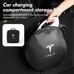 May include: Black round storage bag with a white Tesla logo. The bag is designed to hold a car charging cable and is labelled "Car charging compartment storage bag".