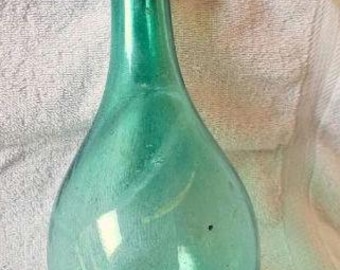 Vintage hand blown green saddle Flask. (Rare)
