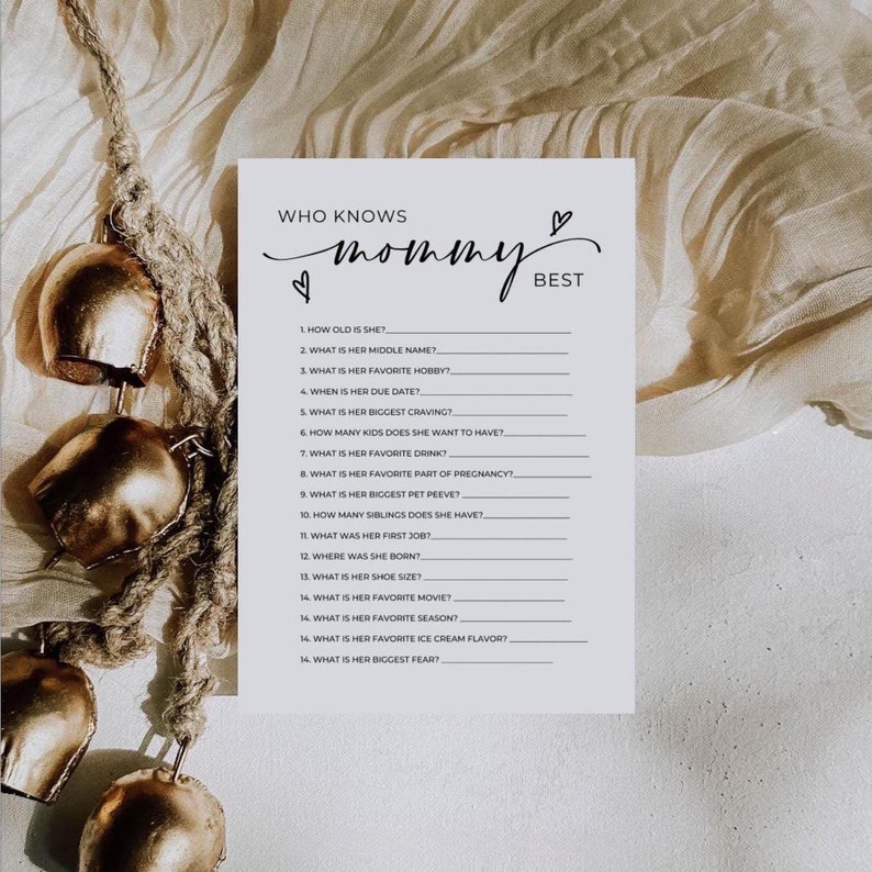 May include: A printable "Who Knows Mommy Best?" game with 16 questions about the expectant mother. The questions include her age, middle name, favourite hobby, due date, cravings, and more.