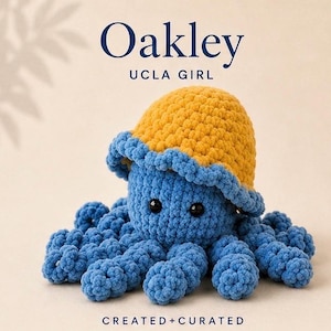 May include: A blue crochet octopus with a yellow and blue hat. The octopus has black eyes and multiple tentacles. The image includes the text "Oakley UCLA GIRL" and "CREATED + CURATED".