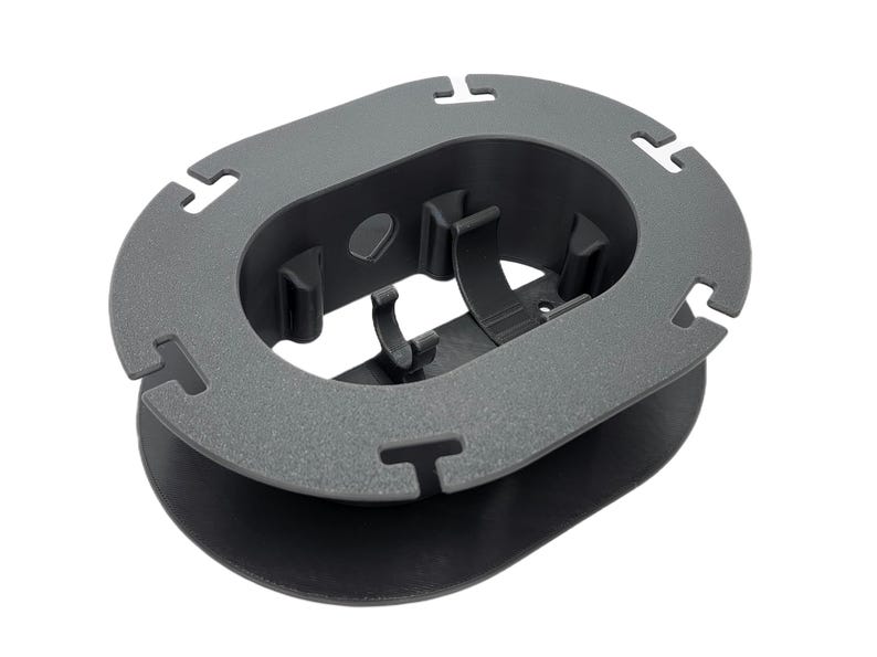 Empty dark grey cable winder accessory for Starlink Mini setup