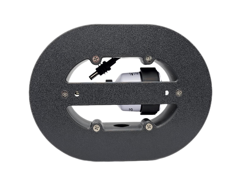 dark grey cable management spool for Starlink Mini antenna