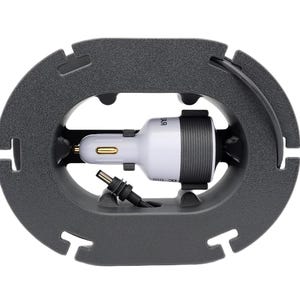 Top view of Starlink Mini cable winder showing integrated connector storage