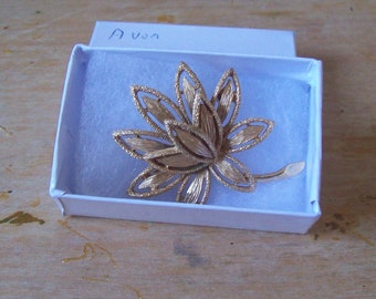 Avon vintage flower brooch  Avon Golden Layered Flower Brooch.