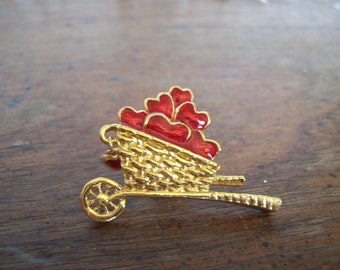 Vintage Avon wheelbarrow with Valintine hearts brooch