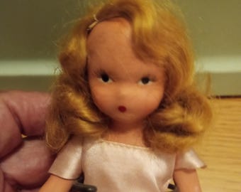 Nancy Ann Story Book Type  Doll Bisque. She is unmarked , 1940s.