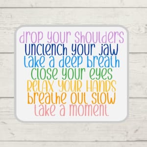 May include: A white square with a colorful text overlay that reads: "drop your shoulders unclench your jaw take a deep breath close your eyes relax your hands breathe out slow take a moment"