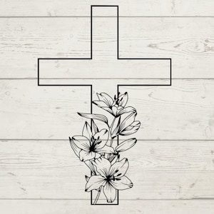 May include: Black outline of a cross with a floral design of lilies. The lilies are in full bloom and are positioned at the bottom of the cross. The background is a light wood grain pattern.