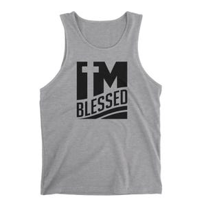 May include: A gray tank top with a black graphic that says "I'M BLESSED" with a cross in the "I".