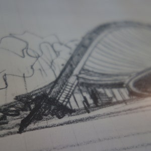 May include: A pencil sketch of a modern building with a curved roof and a large window. The building is surrounded by trees and bushes.