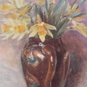 May include: Watercolor painting of a brown vase holding a bouquet of yellow daffodils with green leaves. The vase has a handle and a glossy finish. The background is a soft, muted purple.