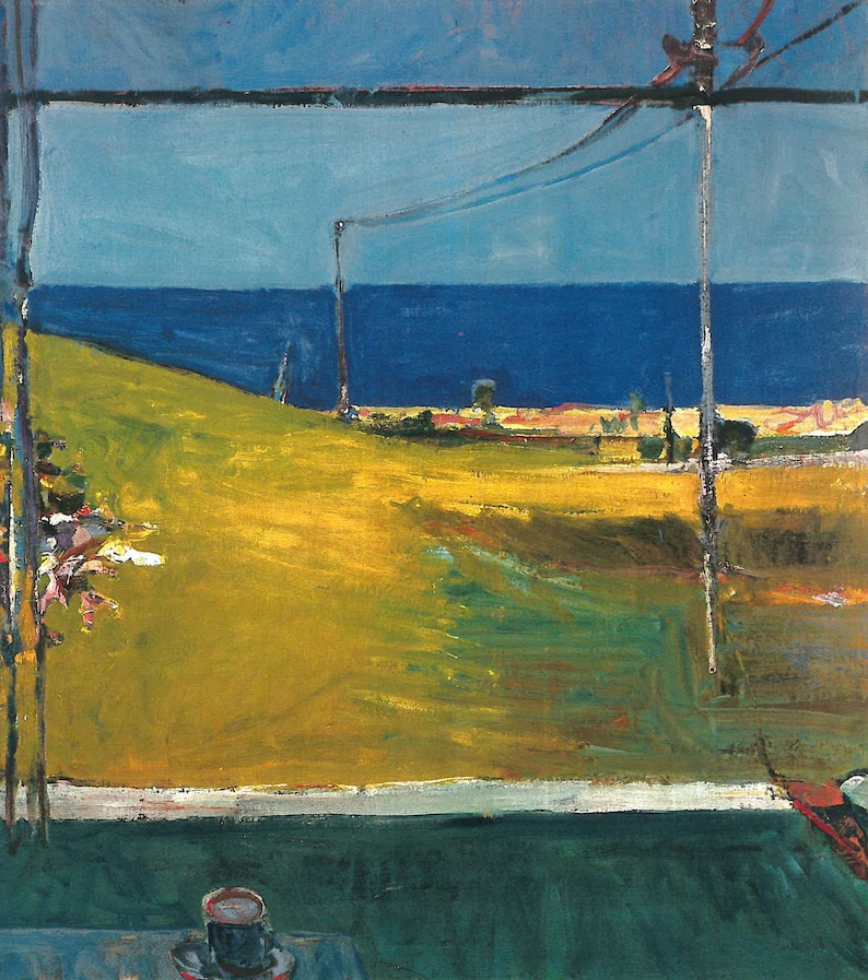May include: A painting of a seascape viewed from a window. The sea is a deep blue, and the sky is a light blue. There is a grassy field in the foreground, and a few trees in the distance. The window frame is black, and there is a cup and saucer on a table in the foreground.