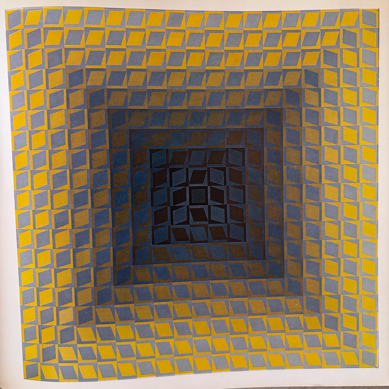 May include: Abstract geometric artwork featuring a square design with concentric squares. The artwork uses a repeating diamond pattern in shades of yellow, blue, and brown, creating a visual depth effect. The piece is on a white background.