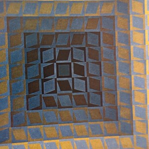 May include: Abstract geometric artwork featuring a repeating pattern of diamonds and squares. The design uses a palette of blue, brown, and gold, creating a visually dynamic and textured effect. The artwork has a retro, mid-century modern aesthetic.