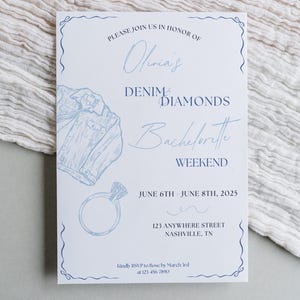 May include: A blue and white invitation for a bachelorette weekend. The invitation says "Olivia's Denim Diamonds Bachelorette Weekend" with the dates June 6th - June 8th, 2025. The invitation also includes a drawing of a denim jacket and a ring.