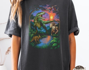 Vintage Jurassic Dinosaur graphic T-shirt, jaren 90 comfort kleuren shirts, retro T-Rex en triceratops shirt, prehistorisch grafisch T-shirt jaren 90, Dino Top