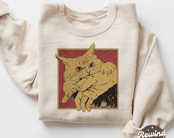 キャットバイトコンフォートカラースウェットシャツ、ミームアニメキャットクルーネック、y2Kセータープルオーバー、猫好きへのギフト