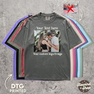 May include: A gray t-shirt with a custom photo and text. The shirt features a family photo with the text "Your Text here" above the image and "Your custom logo/Image" below. The shirt is DTG printed.