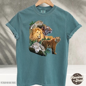 ビッグキャッツ熱帯雨林動物Tシャツ、ヴィンテージ90年代グラフィックシャツ、レトロジャングルTシャツ、ワイルドフリー、トラ、ライオン、猫Tシャツ