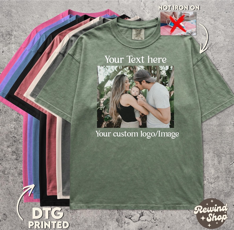 May include: A selection of oversized t-shirts in various colors, including pink, blue, black, and green. The green shirt features a family photo with the text "Your Text here" and "Your custom logo/Image". The shirts are labeled "DTG PRINTED".