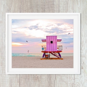 pink lifeguard tower on miami beach at sunrise