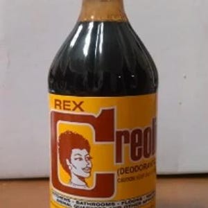 May include: A brown glass bottle with a white cap labelled "REX Creolin (Deodorant) CAUTION KEEP OUT OF REACH OF CHILDREN.  BATHROOMS - FLOORS - ANIMAL QUARTERS AND OTHER AREAS. NET CONTENT: 16 OZ (1 PINT)"