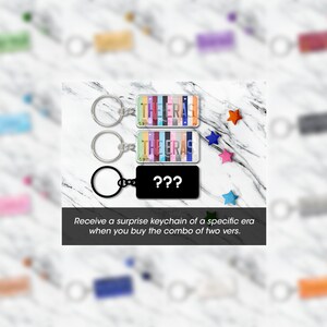 May include: Keychains with the text "THE ERAS" in colorful letters. One keychain is black with "???" printed on it. The image includes text that reads "Receive a surprise keychain of a specific era when you buy the combo of two vers."