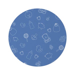 May include: A round, blue patterned fabric featuring white line art illustrations of baby-related items. The design includes baby bottles, pacifiers, teddy bears, ducks, and alphabet blocks. The overall theme is baby and nursery.