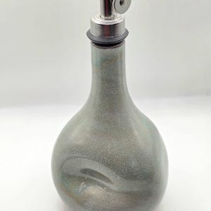 Blue-Gray Oil Bottle – Hand Thrown Ceramic with Brown Clay Thumbprint Grip, Artisan Pottery