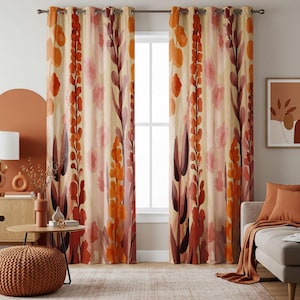 May include: A pair of orange, pink and brown patterned curtains with grommet tops. The curtains are hung on a window with white trim.