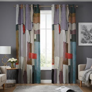 May include: A pair of abstract patterned curtains with a geometric design in shades of grey, brown, red, and blue. The curtains have eyelets and are hung on a pole.