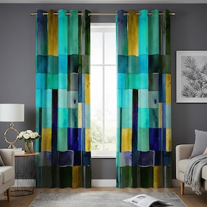 May include: A pair of vibrant, watercolor-style curtains. The design features a patchwork of rectangular blocks in shades of teal, turquoise, yellow, and navy blue. The curtains hang from a silver rod, adding a pop of color to any room.