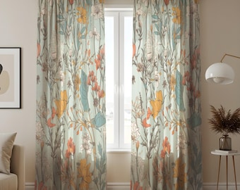 May include: Floral patterned curtains in shades of orange, yellow, blue, and white on a light green background. The curtains feature a botanical design with various flowers and foliage, creating a natural and elegant aesthetic. The curtains are hanging in front of a window.