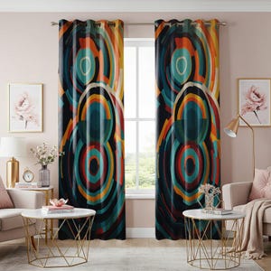 May include: A pair of colorful curtains with a geometric pattern of overlapping circles in shades of blue, orange, yellow, red, and white. The curtains have grommets at the top and are hung on a window.