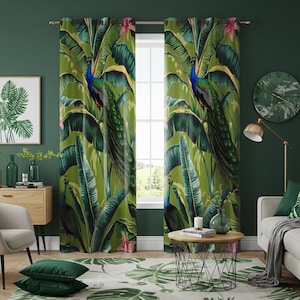 May include: A pair of green curtains with a tropical print featuring peacocks and banana leaves. The curtains are hung on a window with a green wall behind them.