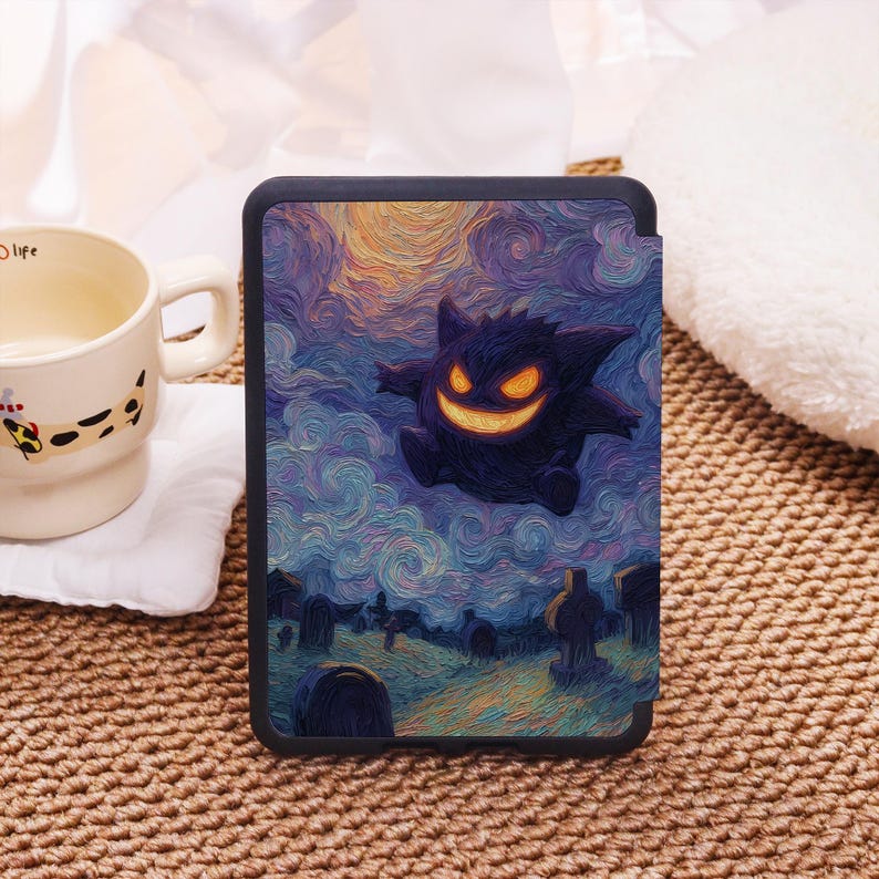 May include: Black tablet case featuring a stylized illustration of a Gengar character against a swirling night sky and graveyard scene. The artwork has a painterly style with vibrant colors, including orange, purple, and yellow.