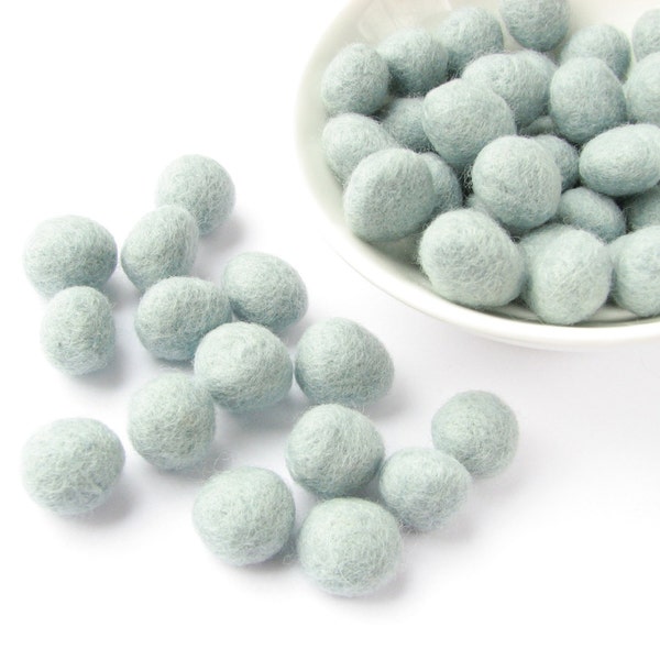 Mix of 30 light sky blue  felted wool rondelle beads. Perfect for decoration or jewelry