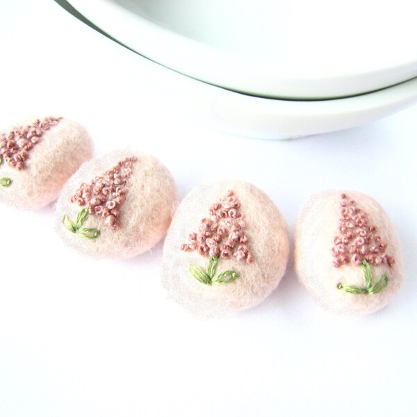 Set of flat light pink felted wool beads with floral ornaments (dust rose, green)