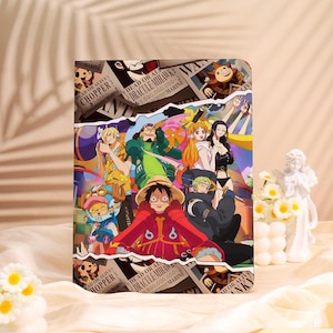 May include: A vibrant cover illustration featuring characters from the anime series One Piece. The design showcases various characters in dynamic poses, with wanted posters and the text "DEAD OR ALIVE" visible.