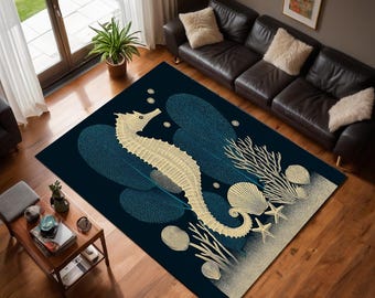 May include: A rectangular area rug featuring a seahorse design. The rug has a dark blue background with a large cream-colored seahorse, blue leaf-like shapes, and beige coral and seashells. The rug is placed on a hardwood floor.