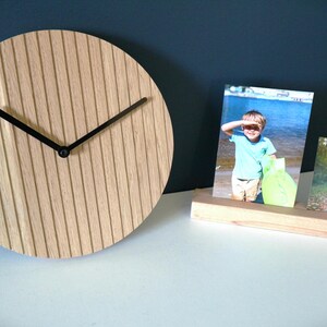 Oak wall or table clock with silent, non-ticking mechanism; modern minimalist clock in light wood with black hands