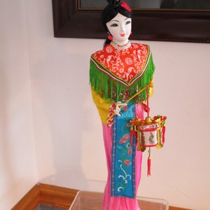 Authentic Chinese Hand Made Geisha Doll Beautiful Painted Face Holding a Chinese Lantern.