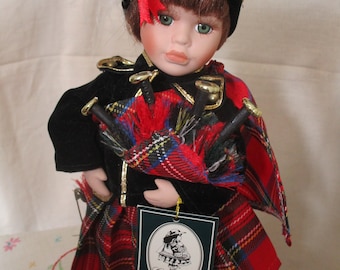 Vintage Geppeddo Scottish Boy Porcelain Doll with Stand with Hang Tag