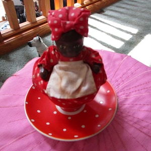 Antique Upsala Ekeby Amanita Cup & Saucer Red White Polka Dot  with  5&quot; Tall  Antique Chalkware Baby Doll
