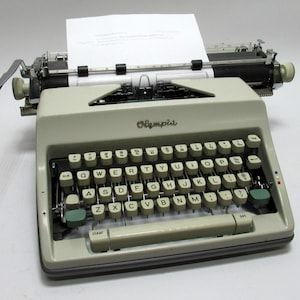 Typewriter Olympia - Etsy