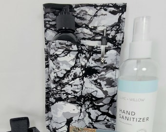 Massage Therapy Single 8oz bottle LEFT hip holster with pen pocket, Black & White Forest Camo