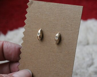 Faceted stud earrings with diamonds in solid 14k yellow gold