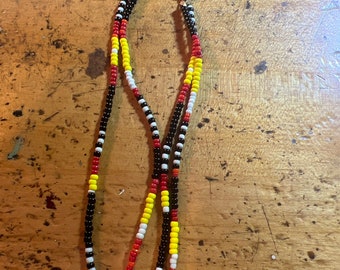 Black, Red, Yellow, and White Shoulder Duster Earrings